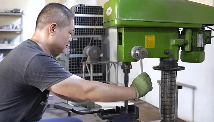 Multi-head embroidery machine at production facility