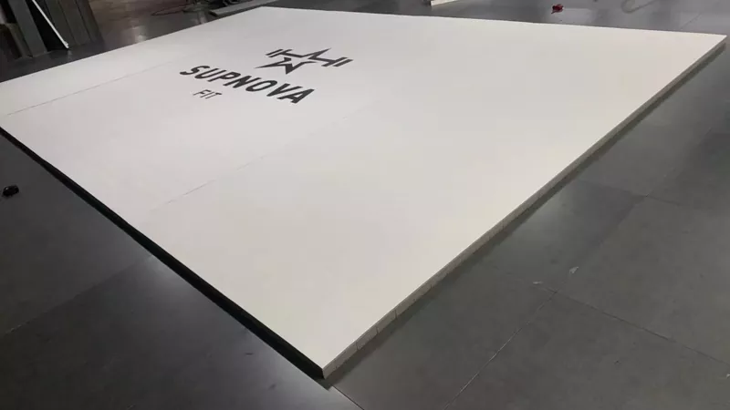 Roll‑out mats stored neatly after training – demonstrating easy roll‑up and space saving