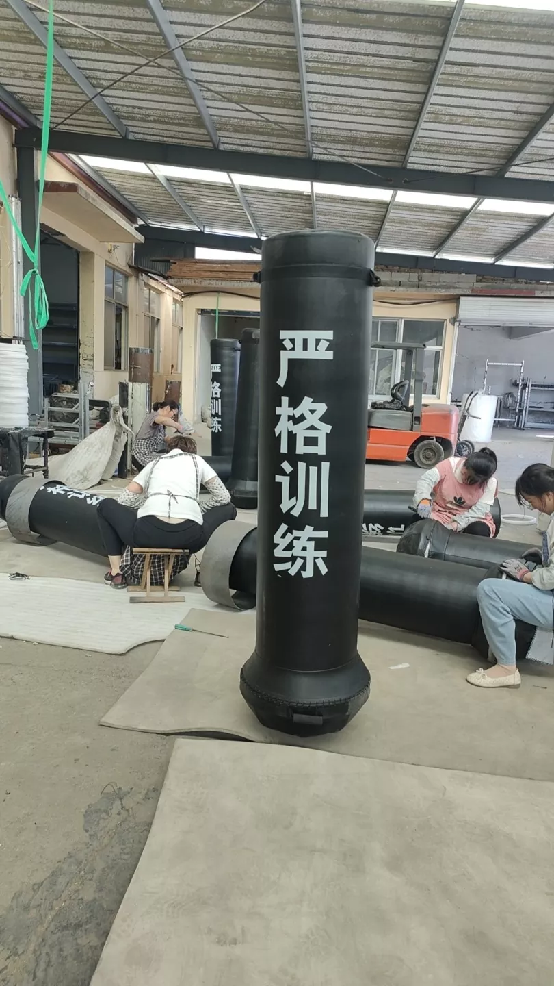 Freestanding punching bags in Pandawin Sports workshop during bulk production