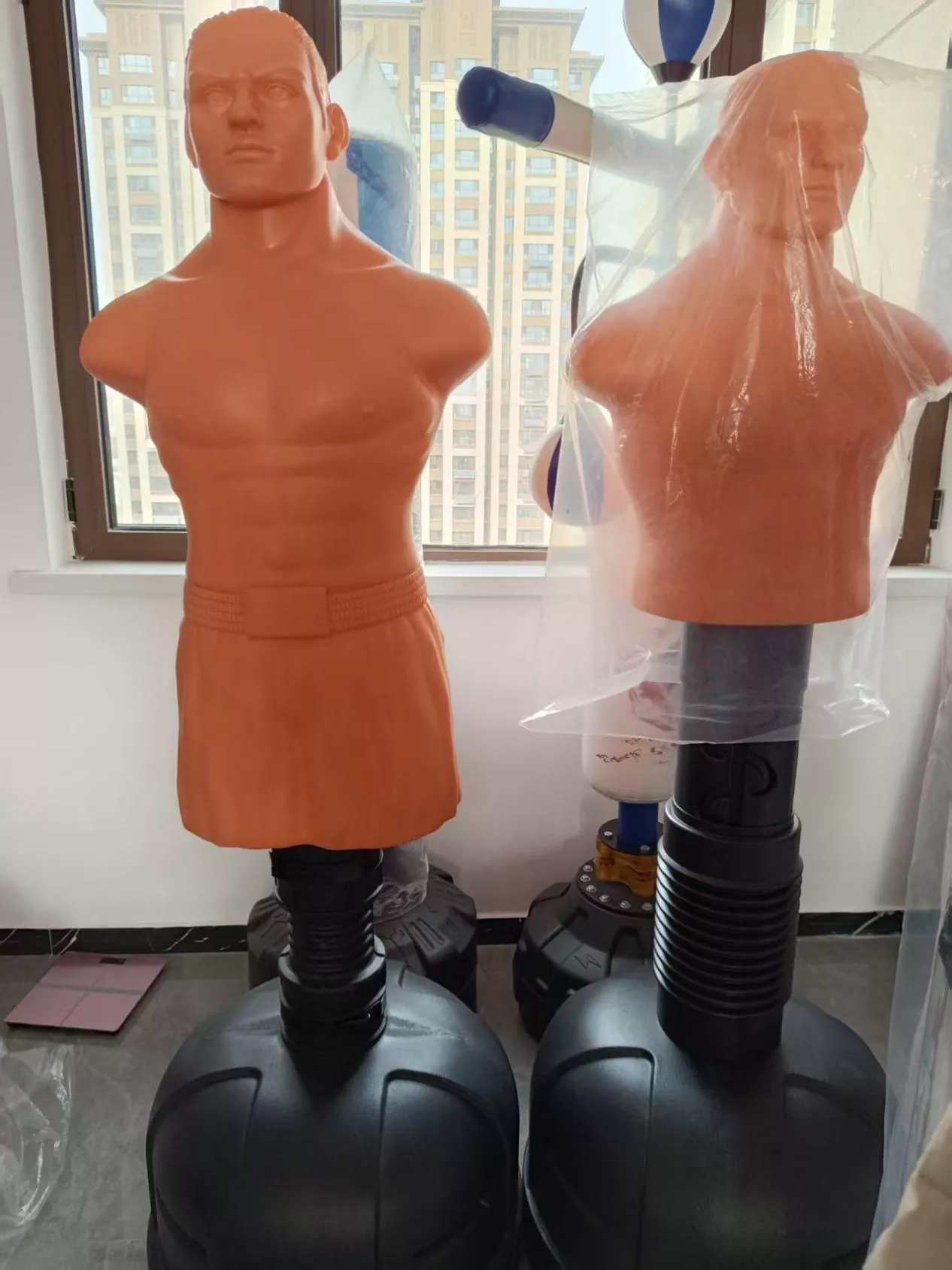Premium adjustable boxing dummy with red and black PU leather and human-shaped anatomical design